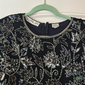 Silk dark blue beaded gown.